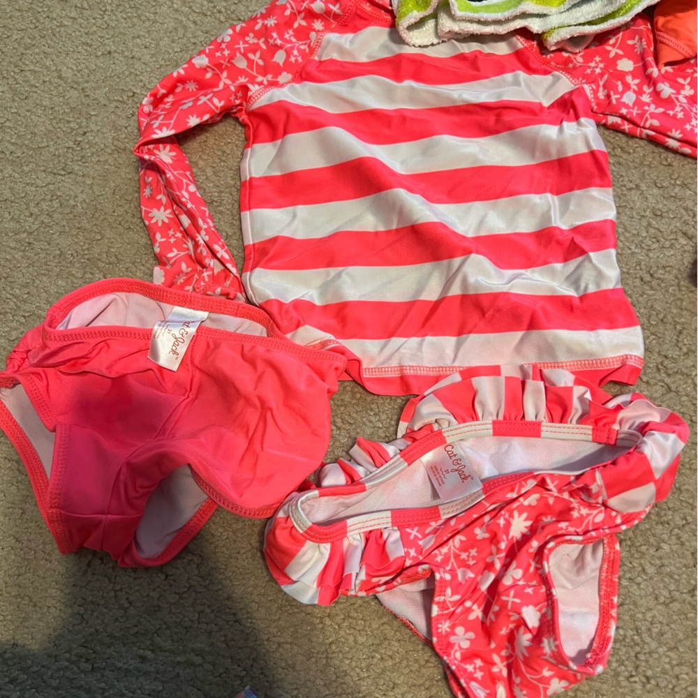 Lot of size 2T swim clothes - girls - one rashguard with shorts and one bikini.